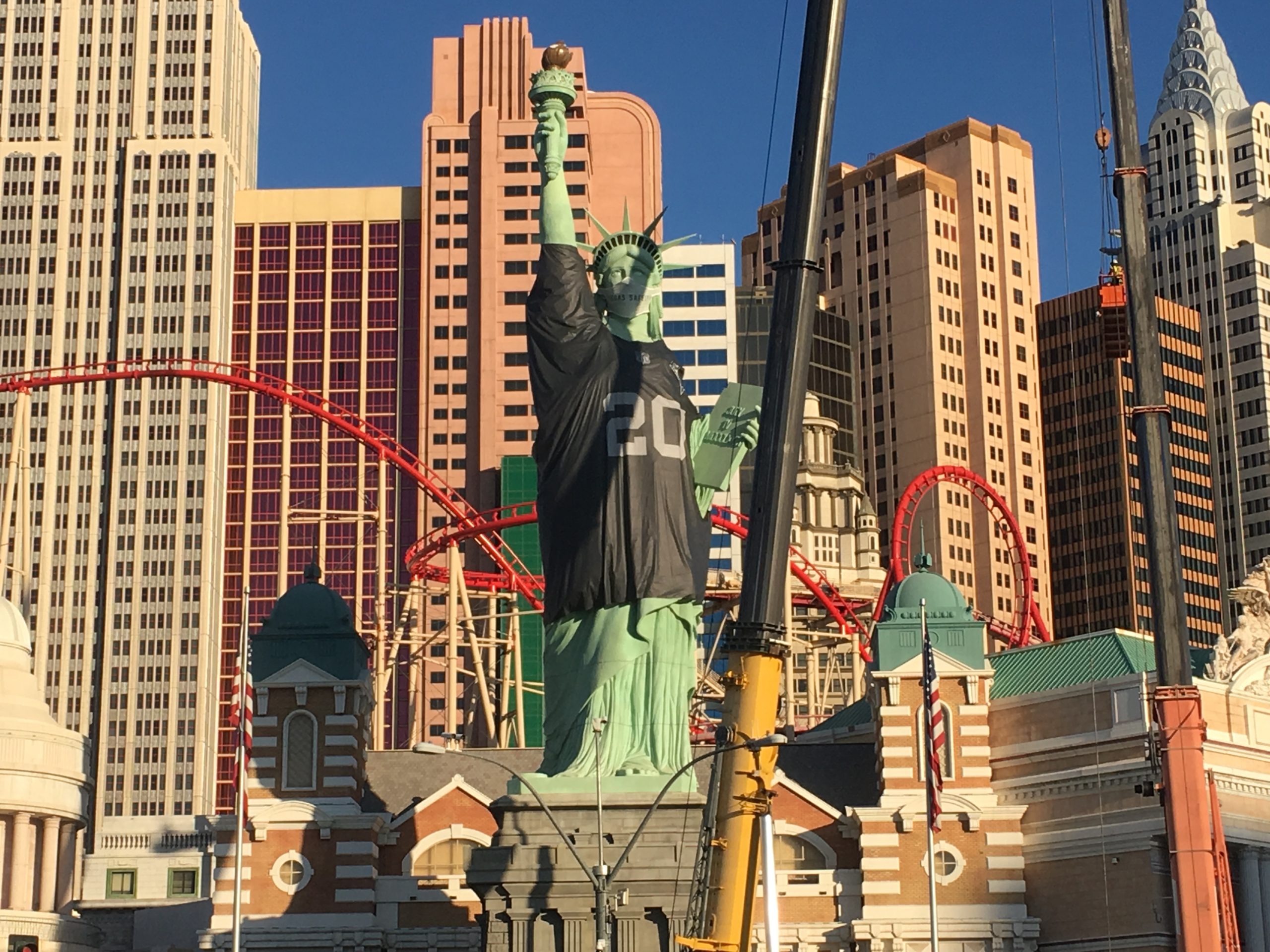 Massive Golden Knights jersey draped over Statue of Liberty at New York-New  York